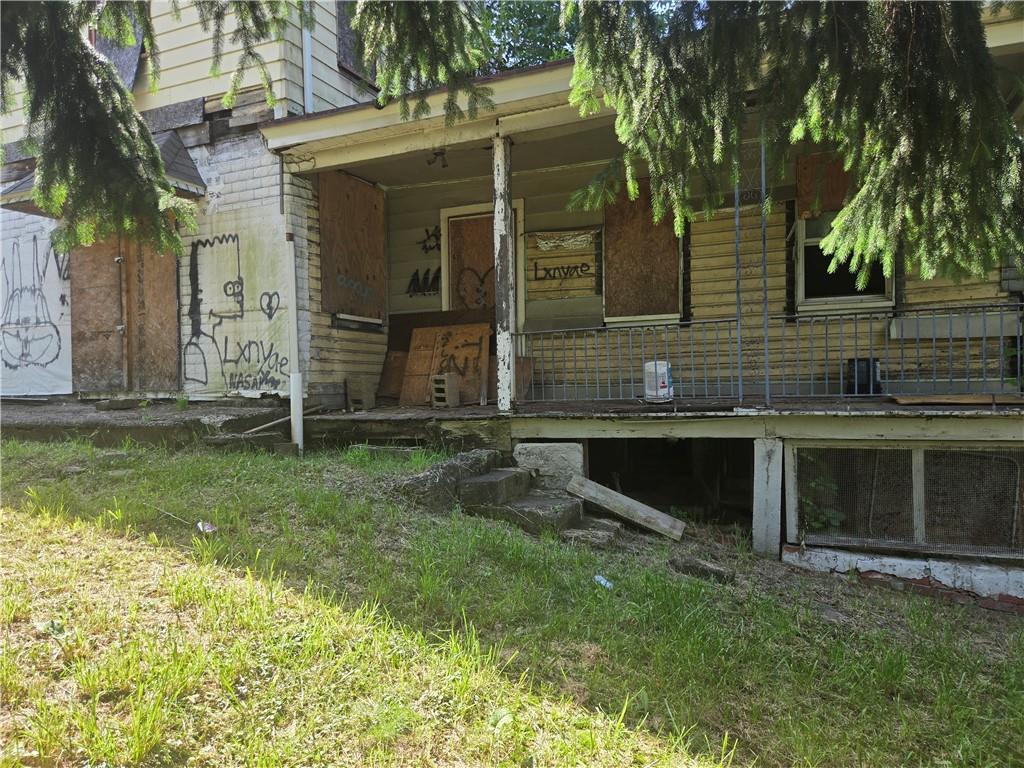 1922 Rhine Street Pittsburgh, PA 15212 - Photo 10 of 32 a front view of a house with a yard