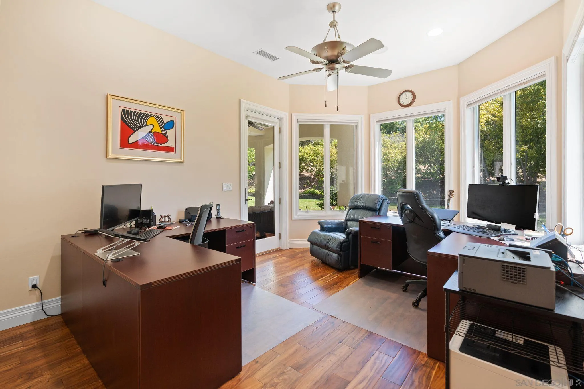 546 Morro Hills Road Fallbrook, CA 92028 - Photo 24 of 52 a view of a workspace with furniture and a window