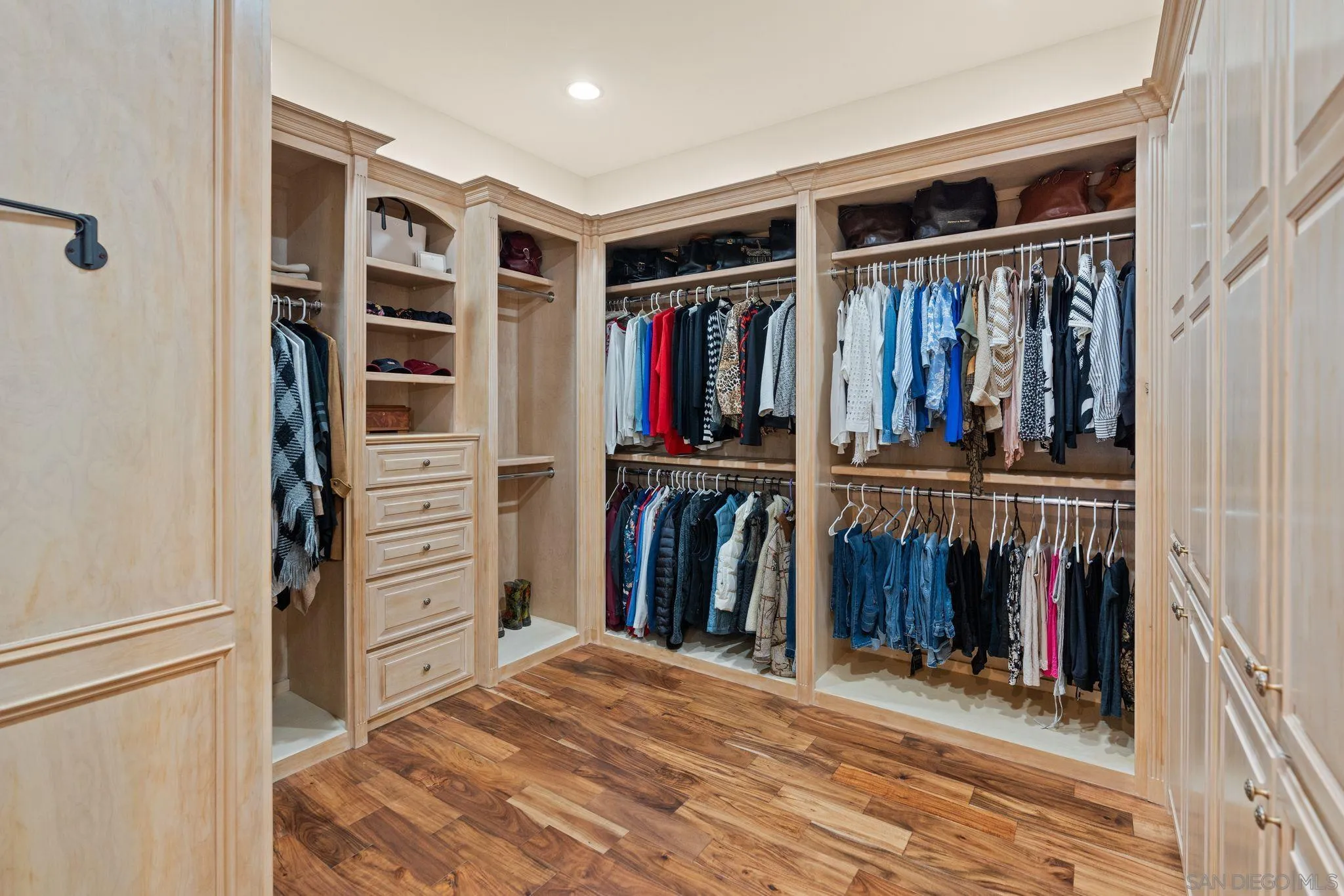 546 Morro Hills Road Fallbrook, CA 92028 - Photo 33 of 52 a view of walk in closet with clothes and shoes