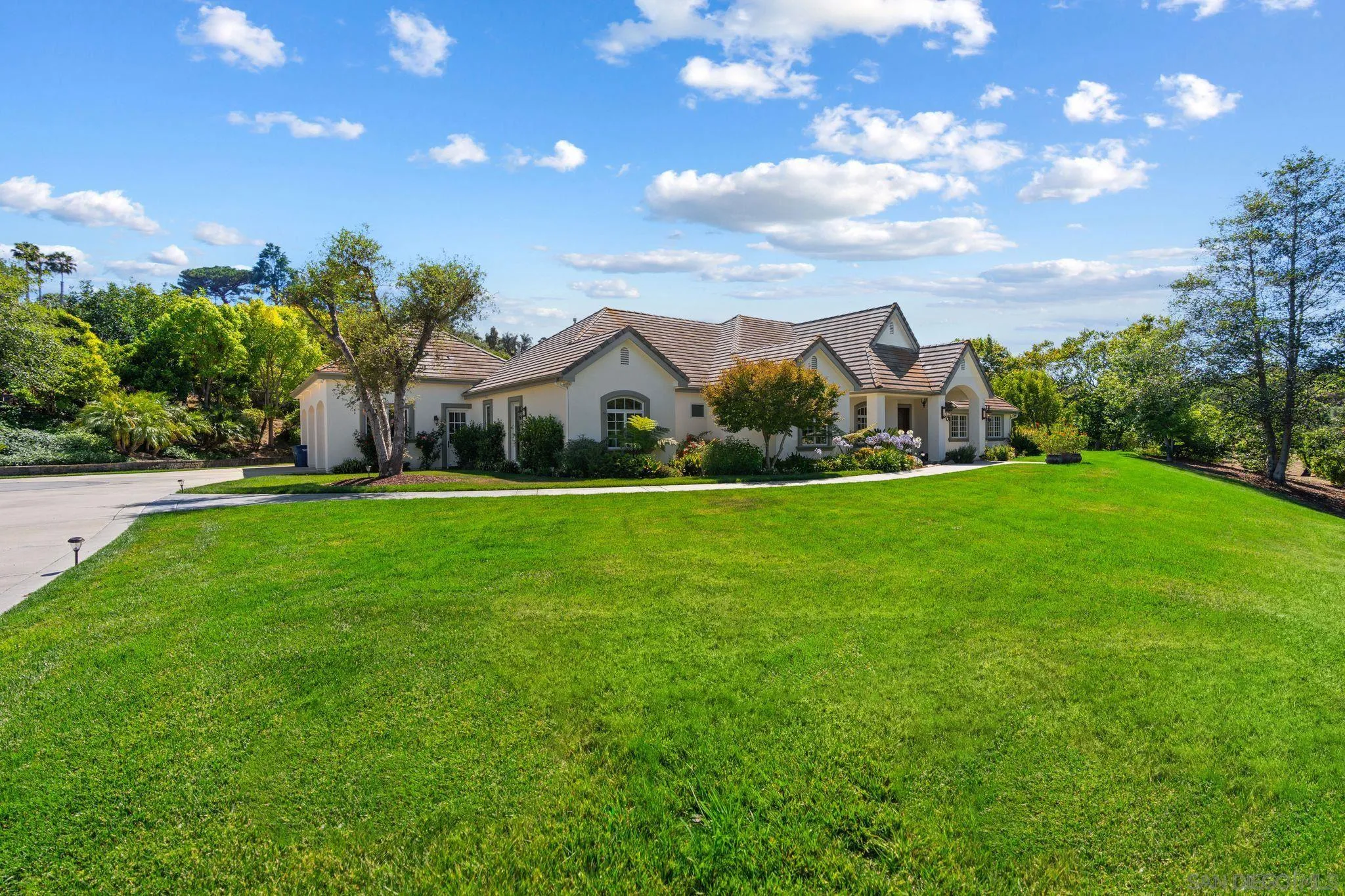 546 Morro Hills Road Fallbrook, CA 92028 - Photo 4 of 52 a view of yard with swimming pool and green space