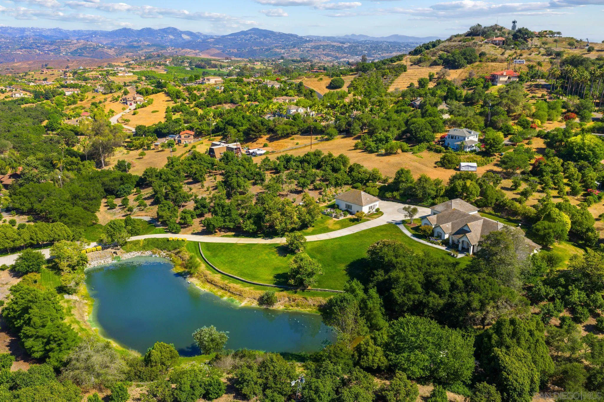 546 Morro Hills Road Fallbrook, CA 92028 - Photo 43 of 52 an aerial view of lake residential houses with outdoor space and swimming pool