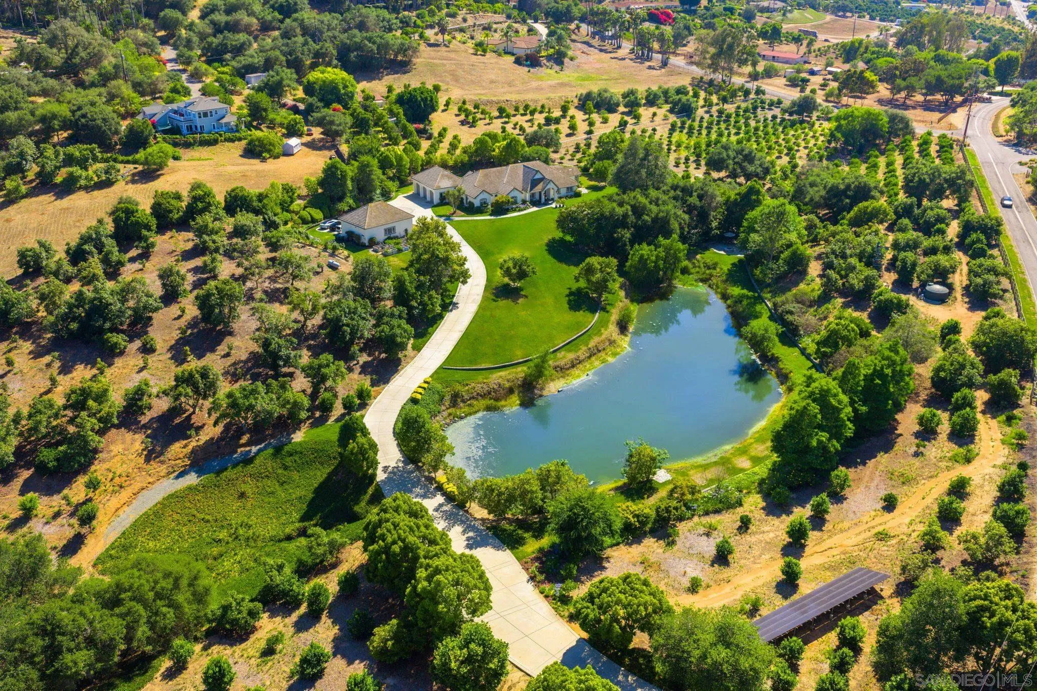 546 Morro Hills Road Fallbrook, CA 92028 - Photo 48 of 52 an aerial view of a residential houses with yard