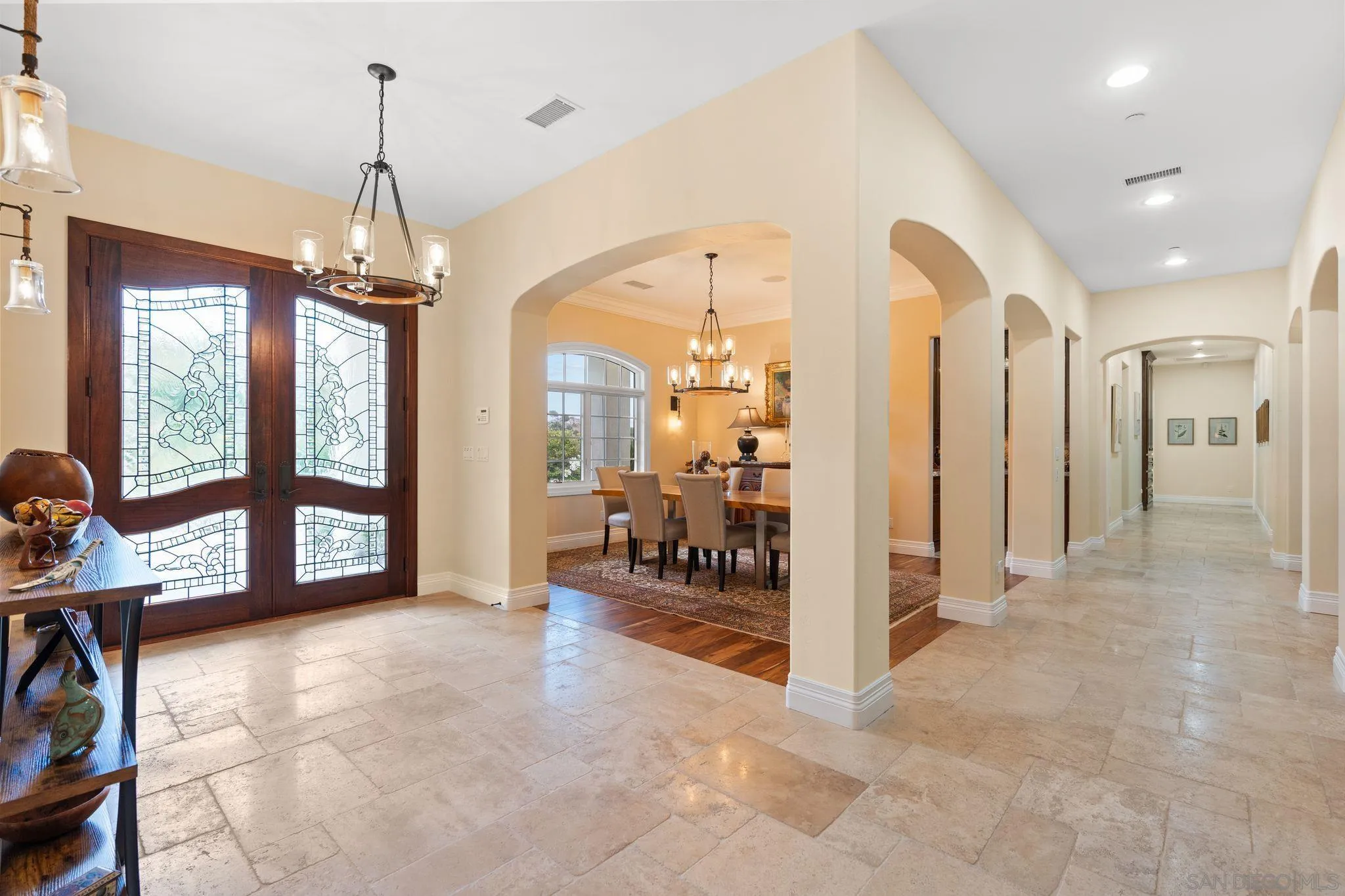 546 Morro Hills Road Fallbrook, CA 92028 - Photo 7 of 52 a view of a livingroom with a furniture and floor to ceiling window