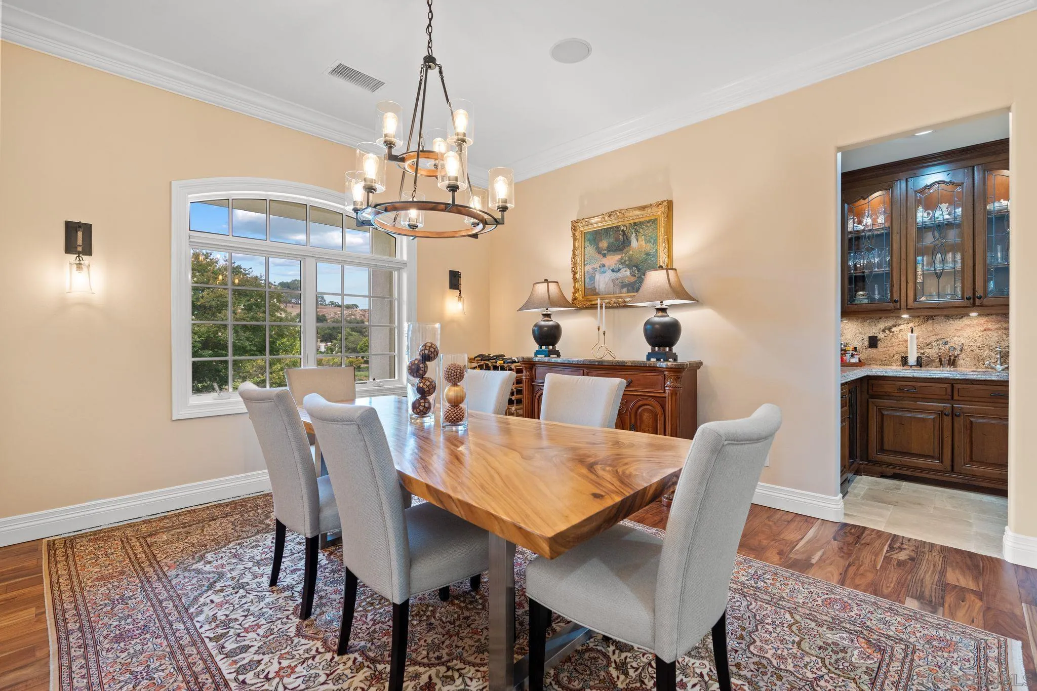 546 Morro Hills Road Fallbrook, CA 92028 - Photo 9 of 52 a view of a dining room with furniture window and wooden floor