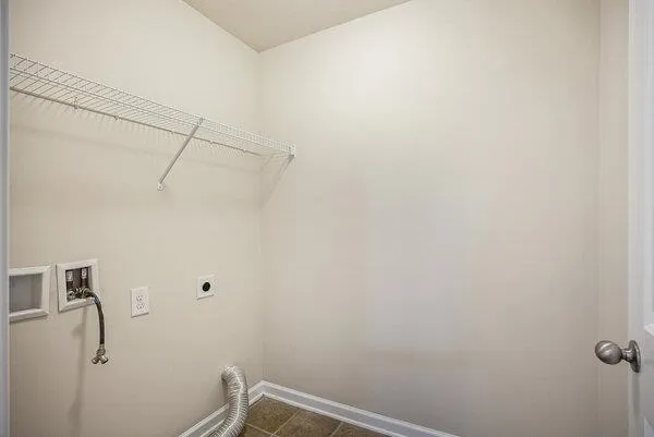 a view of small space with empty racks on the wall