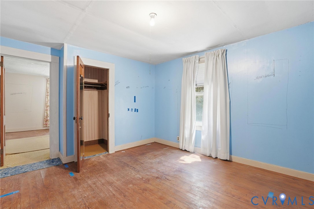 2350 Chelsea Road West Point, VA 23181 - Photo 28 of 34 an empty room with closet and windows