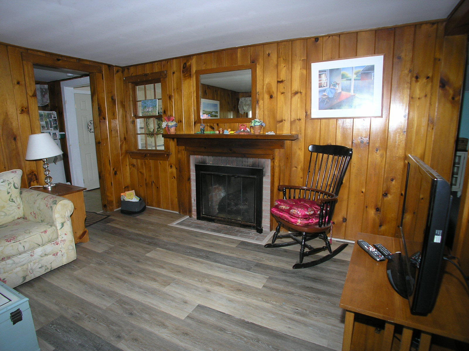 28 Beaten Road Dennis Port, MA 02639 - Photo 3 of 9 a living room with furniture and a fireplace