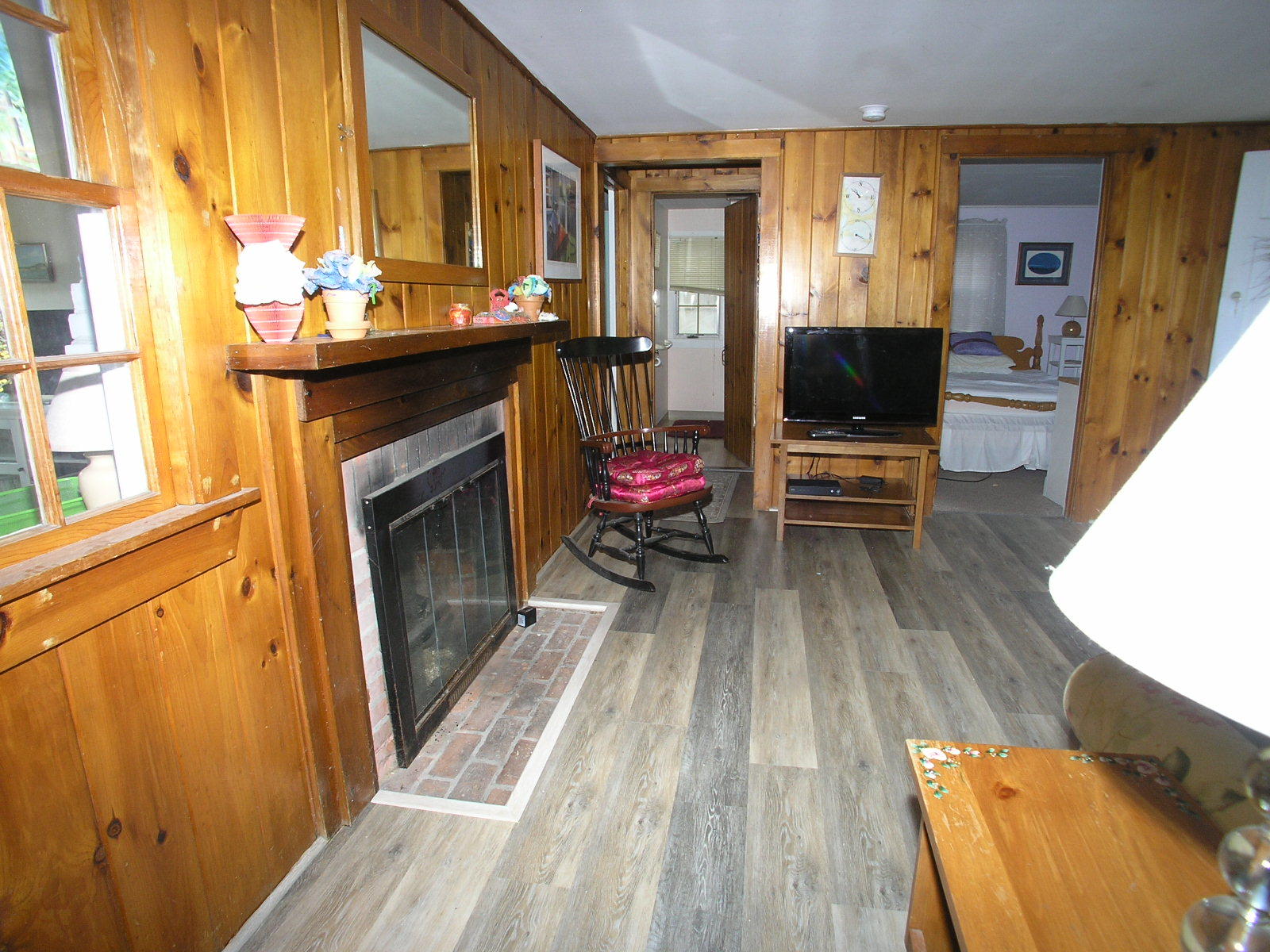 28 Beaten Road Dennis Port, MA 02639 - Photo 4 of 9 a living room with furniture and a fireplace