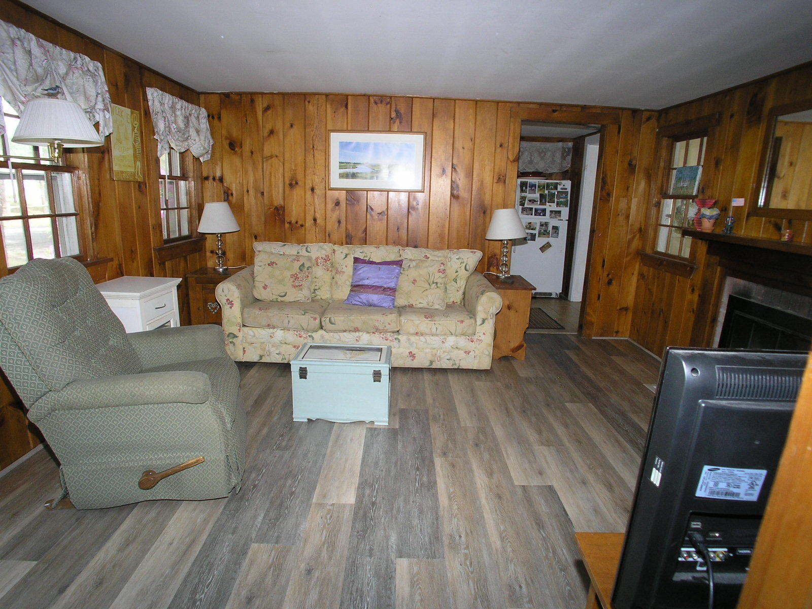 28 Beaten Road Dennis Port, MA 02639 - Photo 8 of 9 a living room with furniture and a flat screen tv