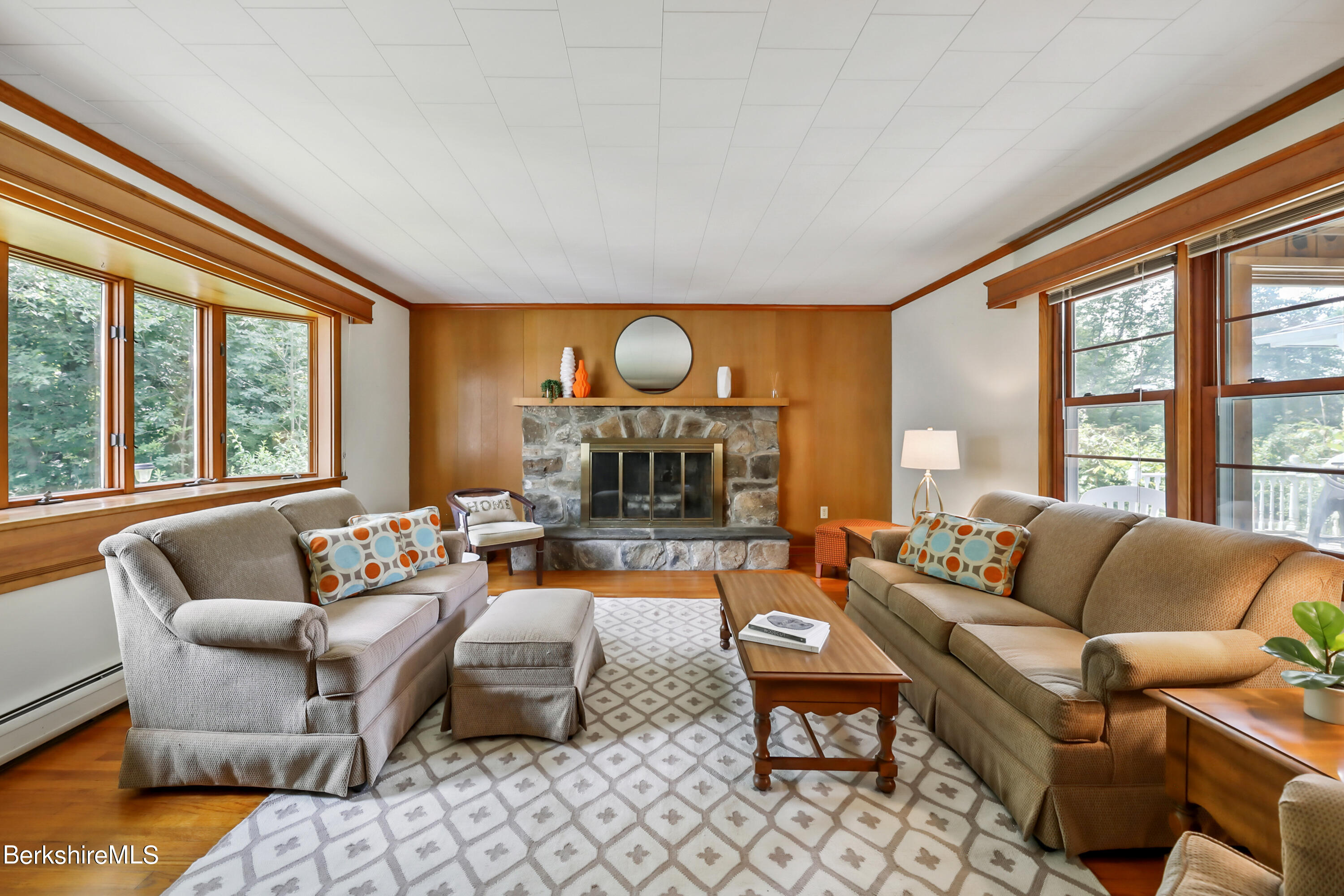 346 Main Road Monterey, MA 01245 - Photo 8 of 28 a living room with furniture fireplace and a large window