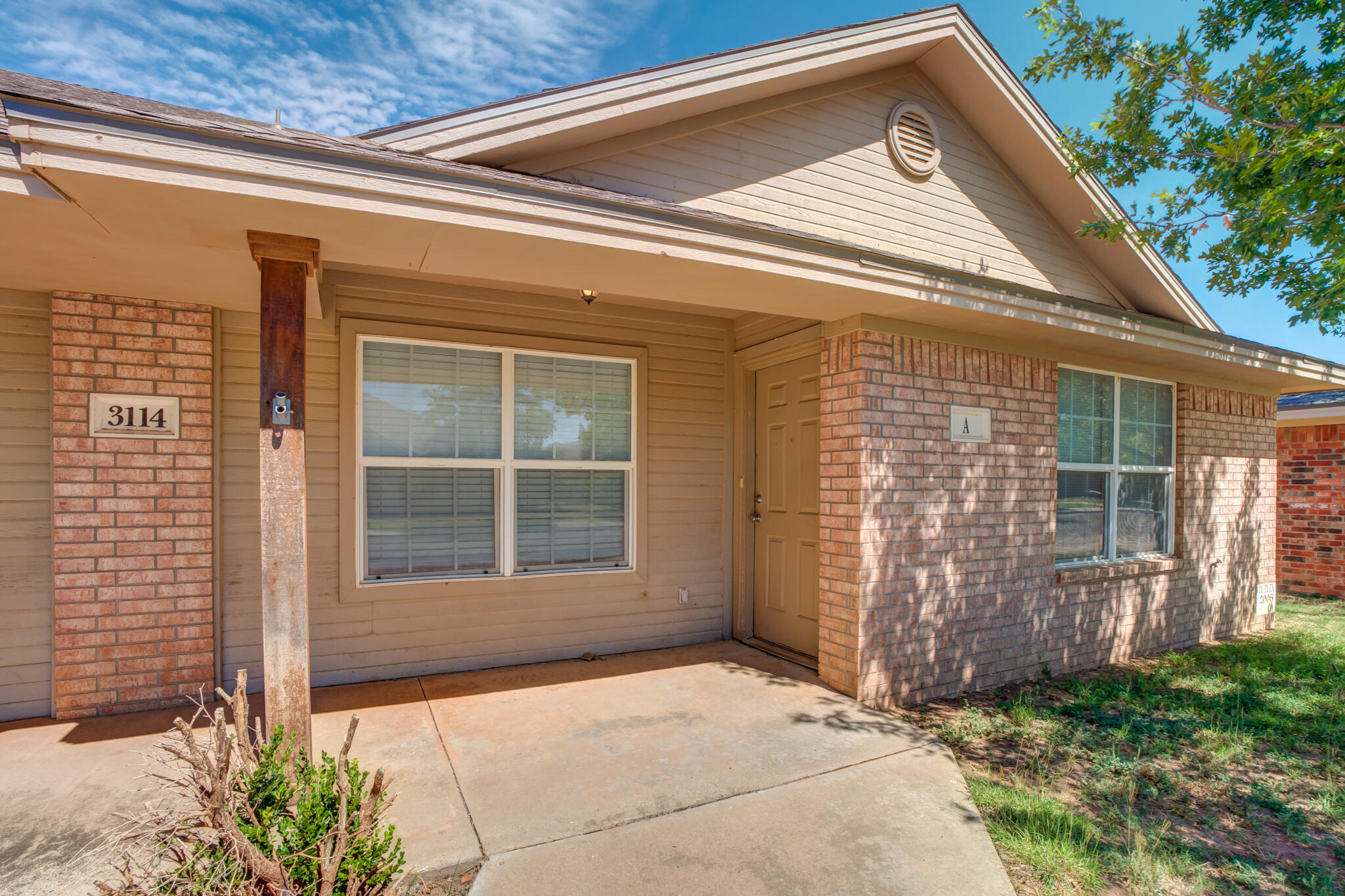 3114 109th Street Lubbock, TX 79423 - Photo 4 of 24 a front view of a house