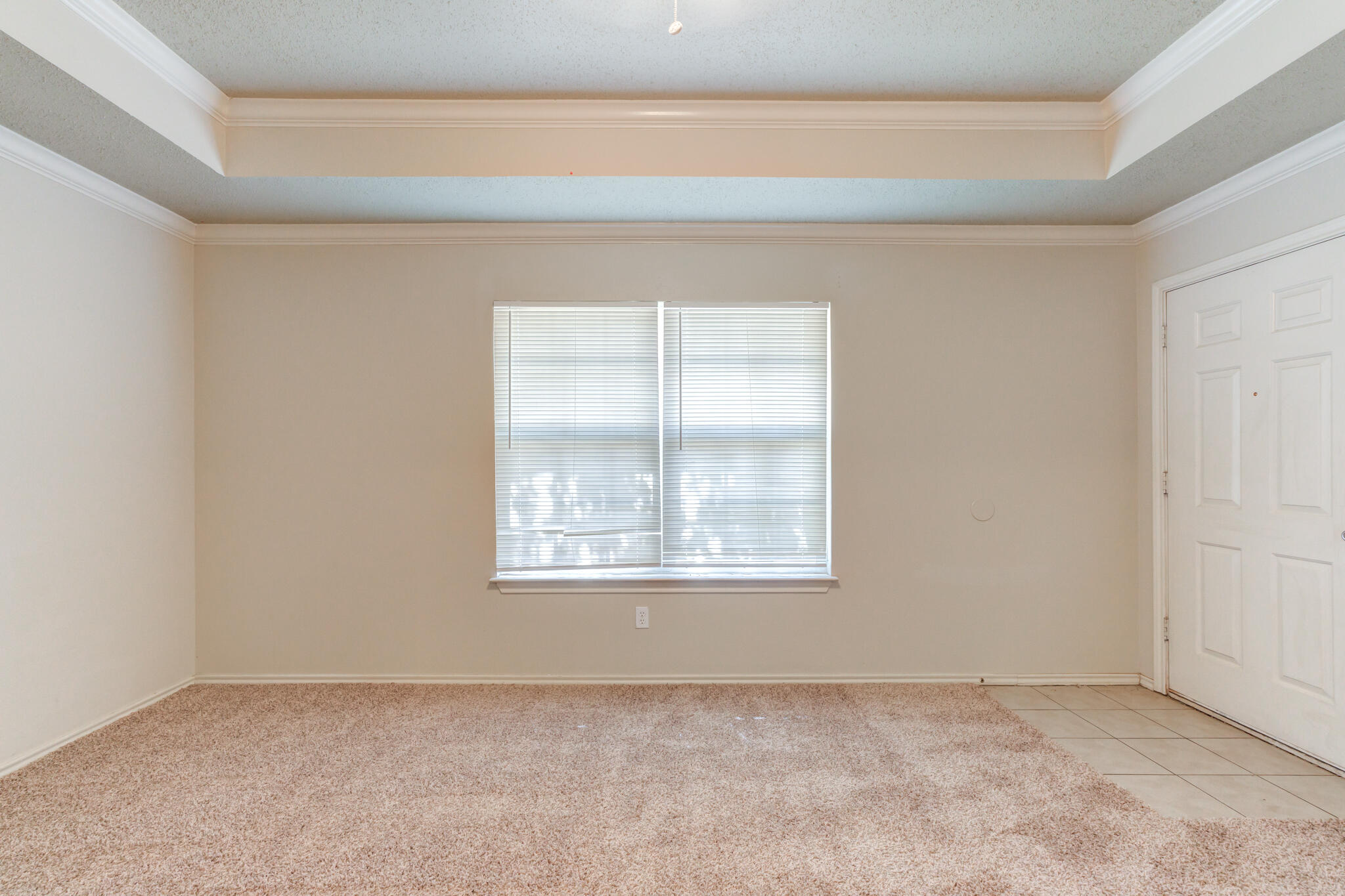 3114 109th Street Lubbock, TX 79423 - Photo 7 of 24 an empty room with a window