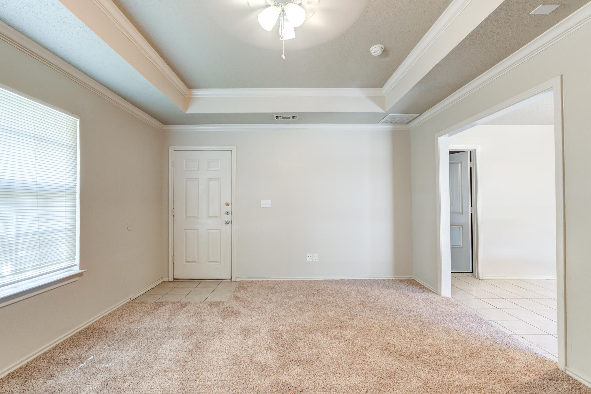 3114 109th Street Lubbock, TX 79423 - Photo 8 of 24 an empty room with windows and closet