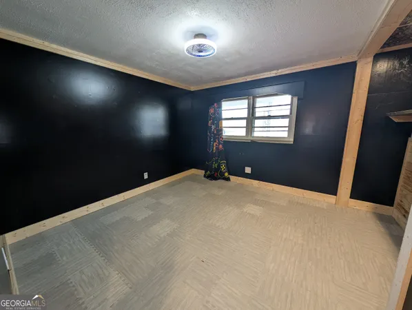 a view of a room next to a window