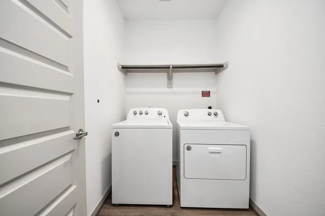 a utility room with dryer and washer