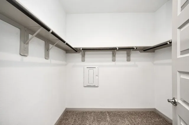 a bathroom with a sink a mirror and shower