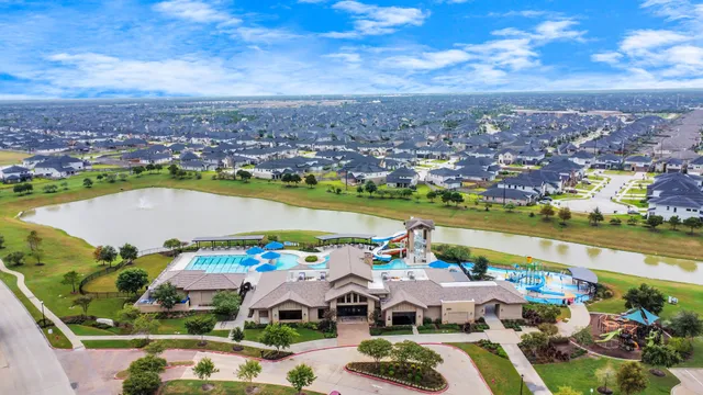 a picture of city view with lake view and mountain view in back