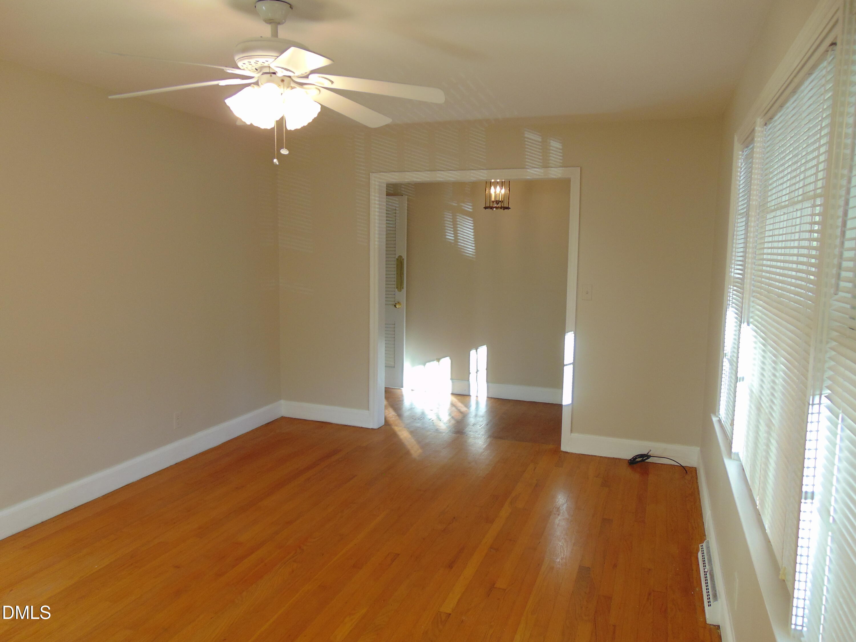 3108 Ridgecrest Drive Rocky Mount, NC 27803 - Photo 12 of 55 wooden floor in an empty room with a window