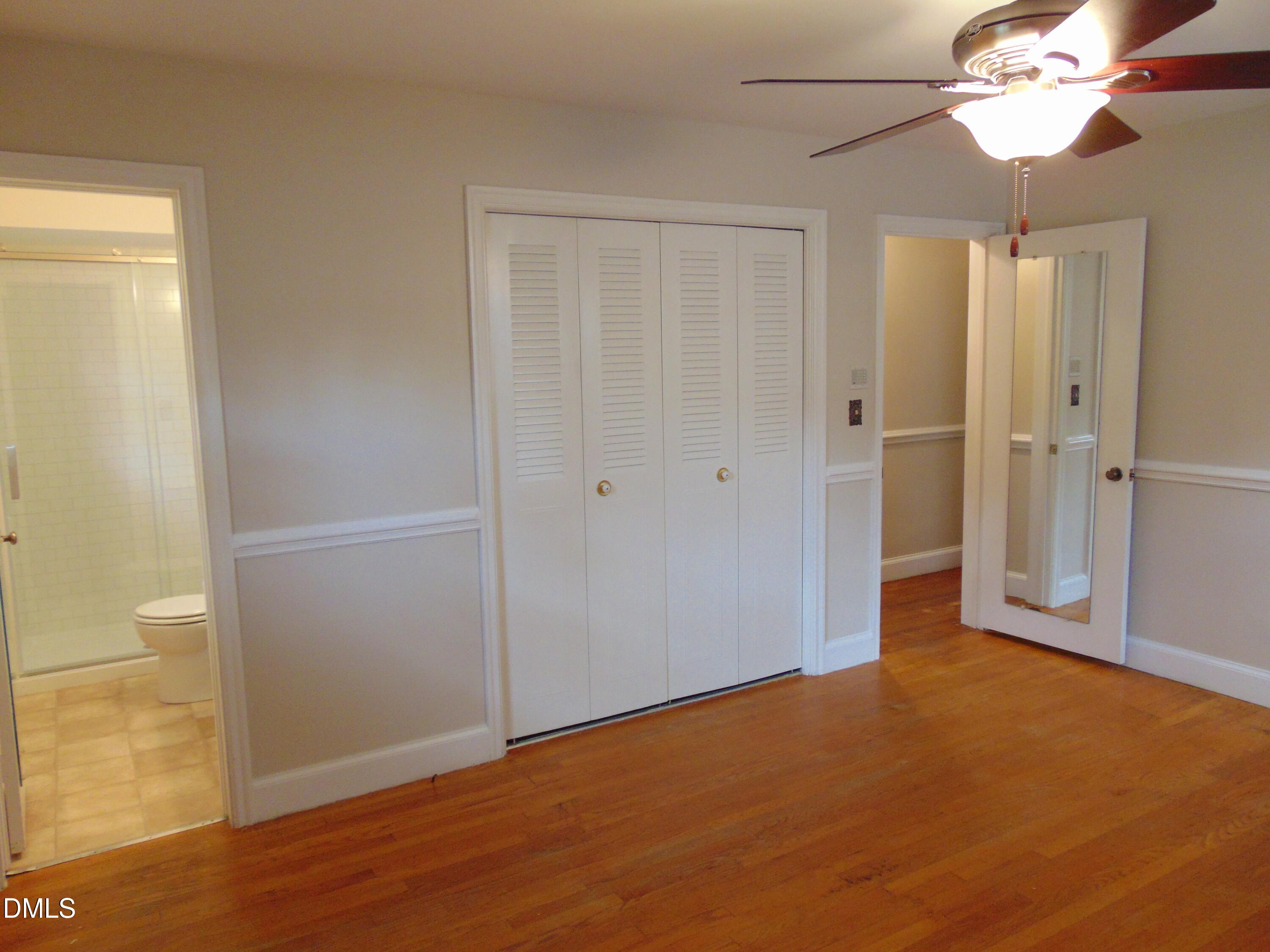 3108 Ridgecrest Drive Rocky Mount, NC 27803 - Photo 28 of 55 an empty room with wooden floor closet and windows
