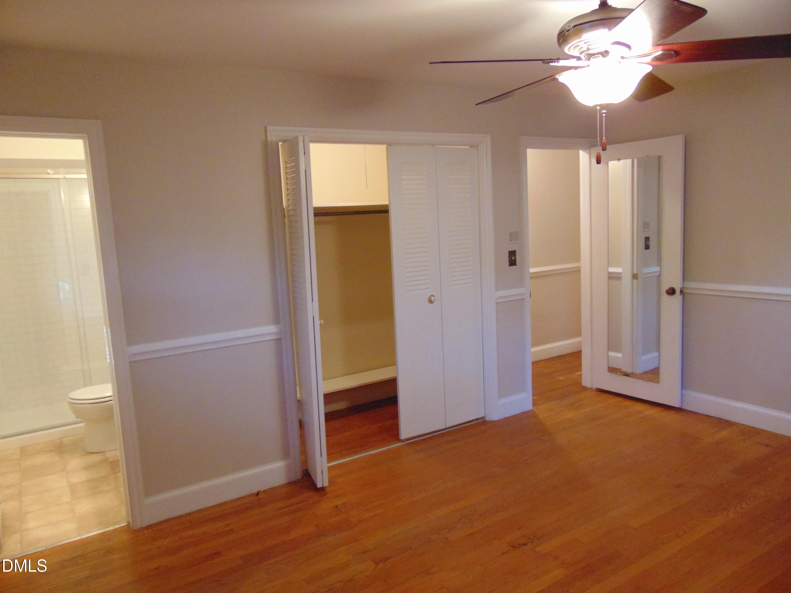 3108 Ridgecrest Drive Rocky Mount, NC 27803 - Photo 31 of 55 an empty room with closet and windows