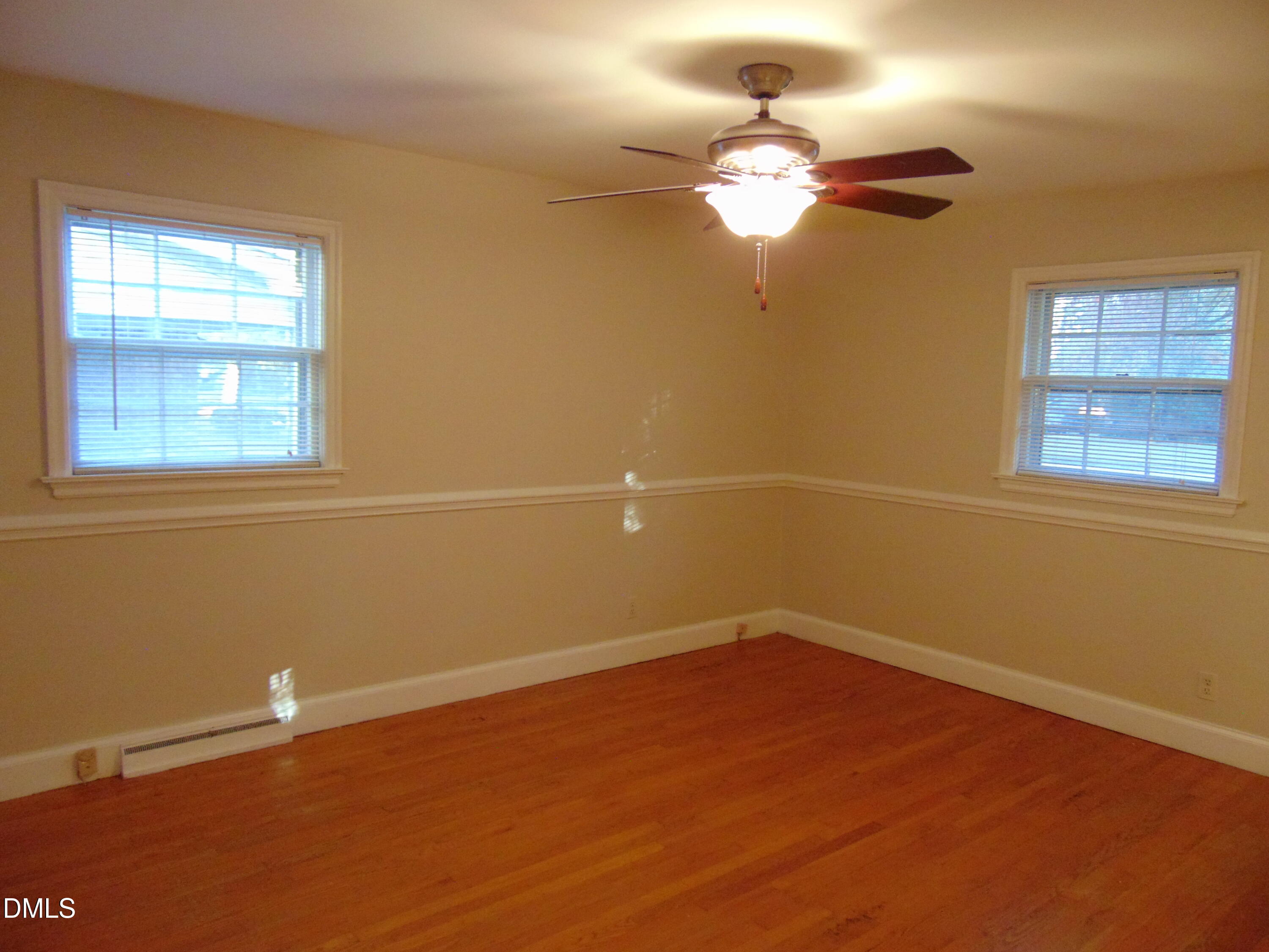 3108 Ridgecrest Drive Rocky Mount, NC 27803 - Photo 32 of 55 a view of a small space with wooden floor and a window