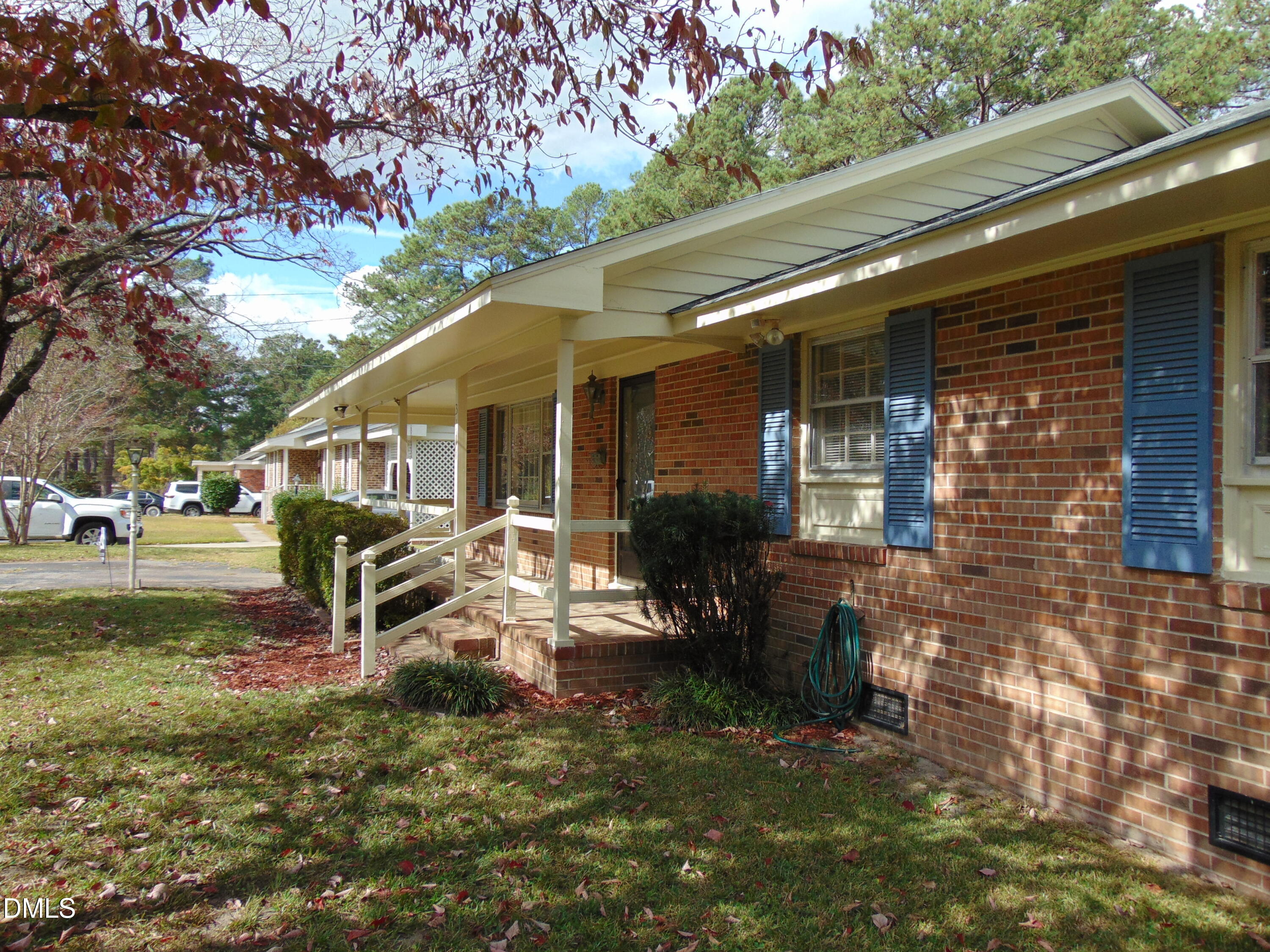 3108 Ridgecrest Drive Rocky Mount, NC 27803 - Photo 8 of 55 a view of a house with backyard porch and sitting area