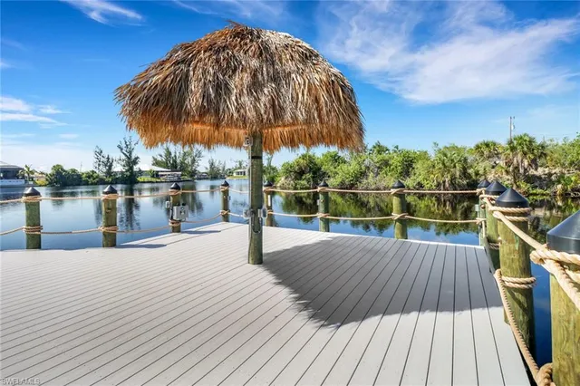 a view of a swimming pool with a deck