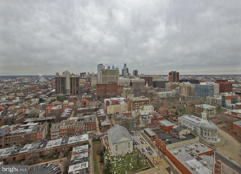 200 Locust Street, Unit 28AN Philadelphia, PA 19106 - Photo 18 of 21 Urban skyline under moody skies.