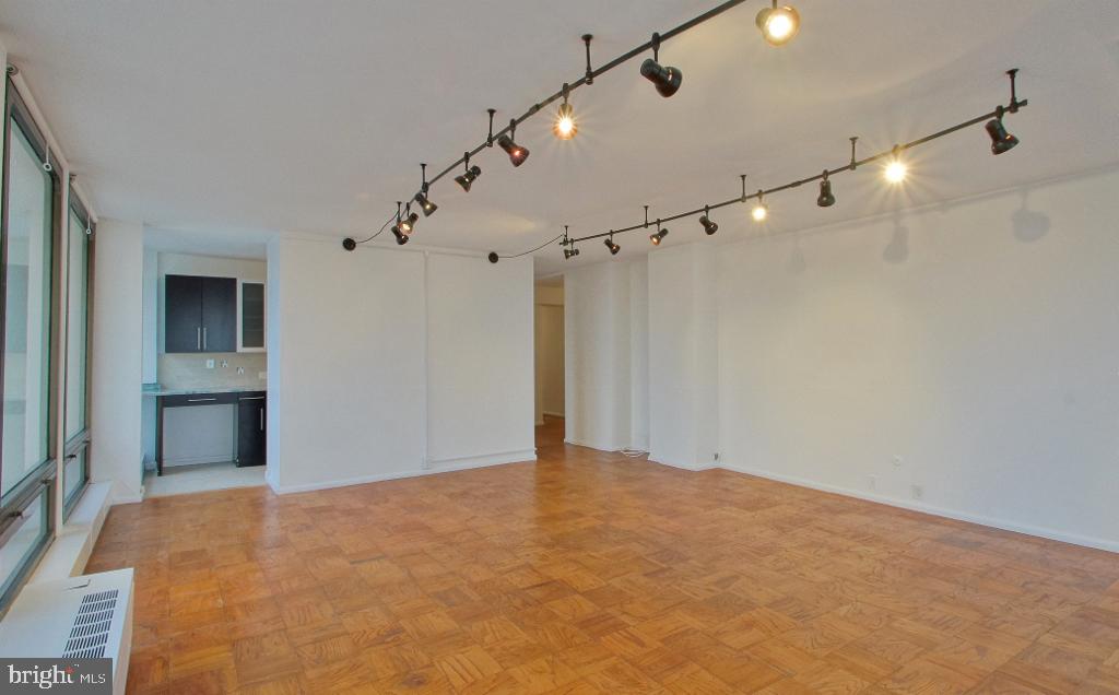 200 Locust Street, Unit 28AN Philadelphia, PA 19106 - Photo 9 of 21 Spacious, sunlit open living area.