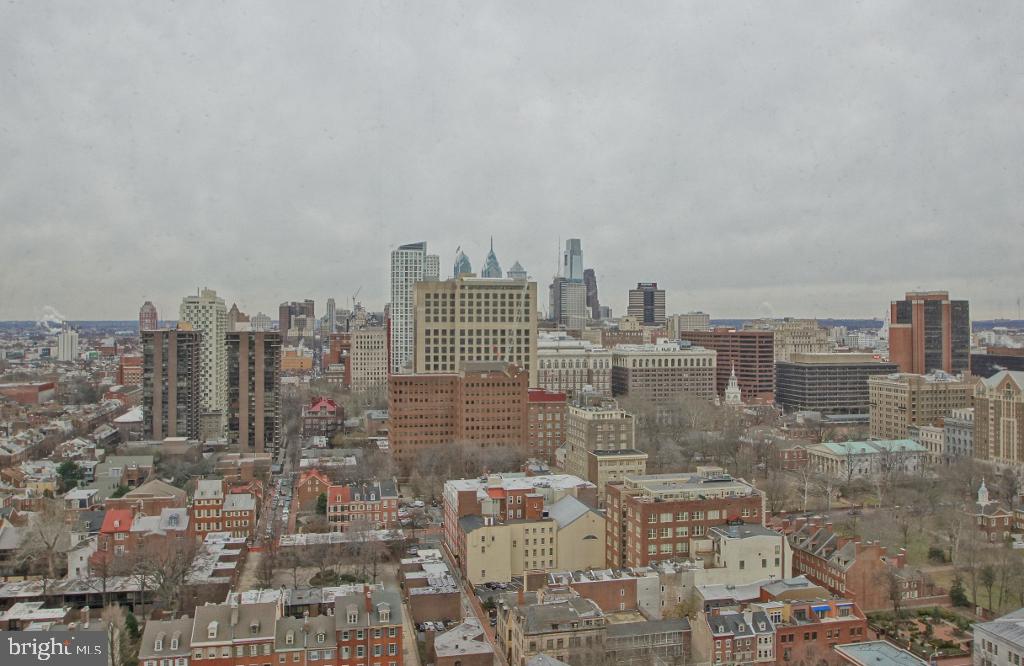 200 Locust Street, Unit 28AN Philadelphia, PA 19106 - Photo 10 of 21 Urban skyline under a cloudy sky.