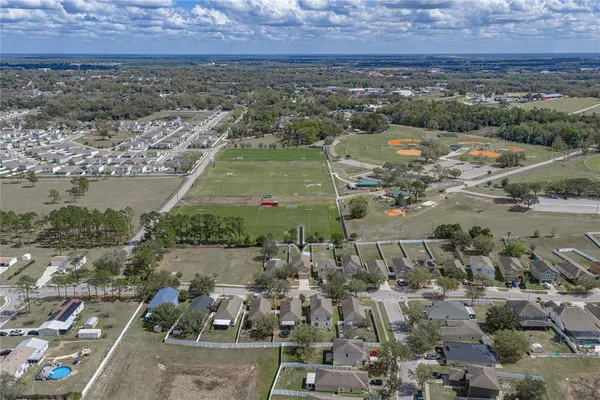 an aerial view of a city with lots of residential buildings