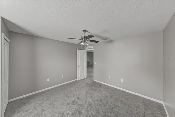 a view of a room that has a large window