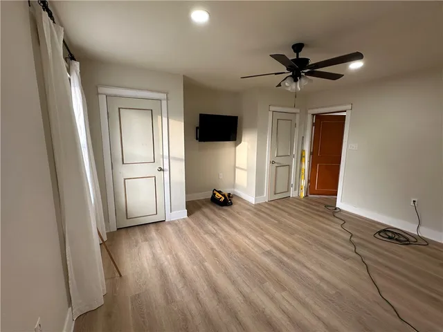 a view of a livingroom with a flat screen tv