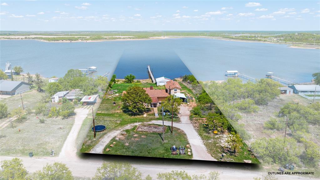 36 Poverty Point Circle Abilene, TX 79601 - Photo 1 of 31 a view of a lake with a mountain
