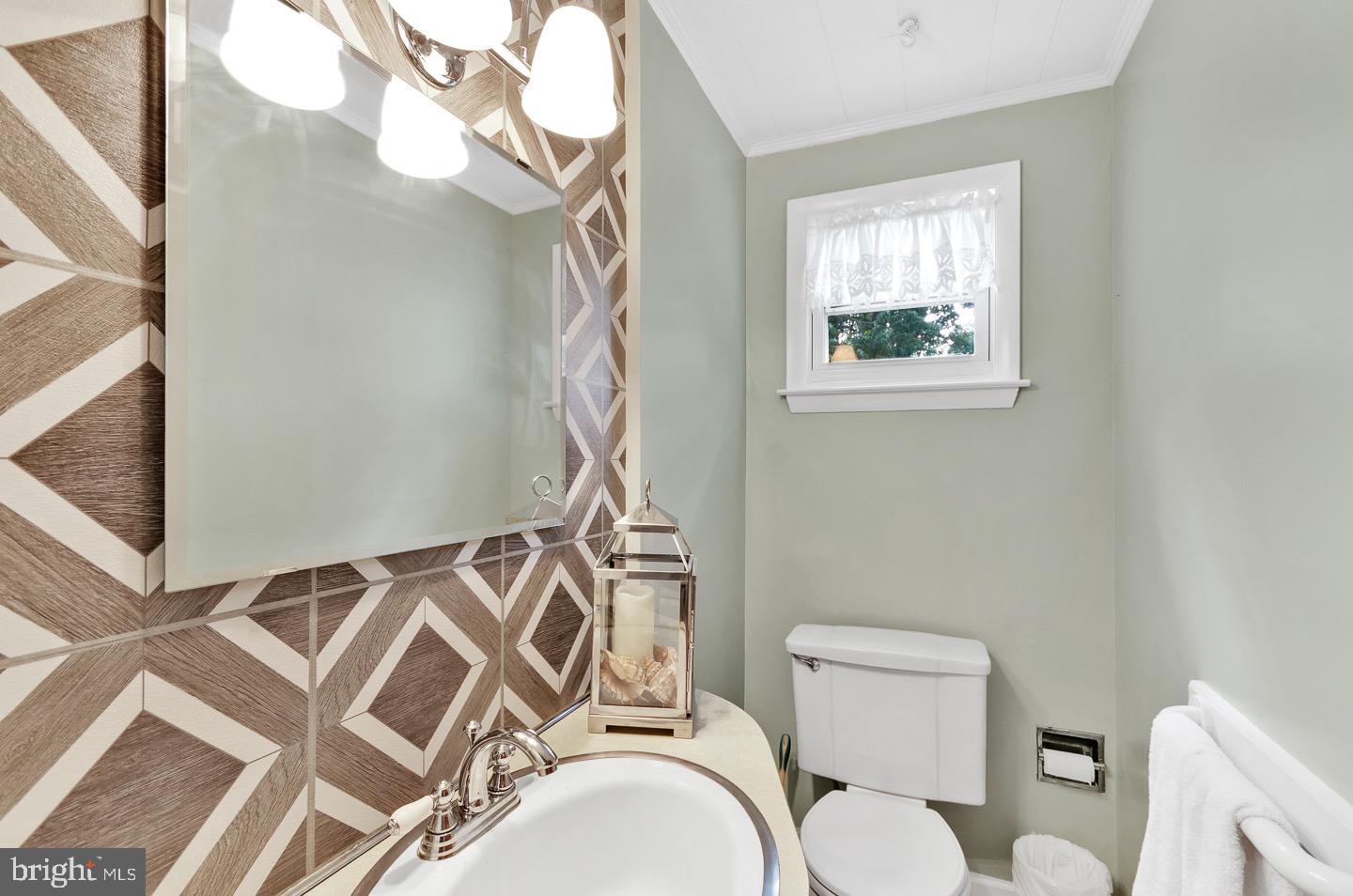 6 Blue Ridge Road Voorhees, NJ 08043 - Photo 22 of 43 a bathroom with a toilet and a sink