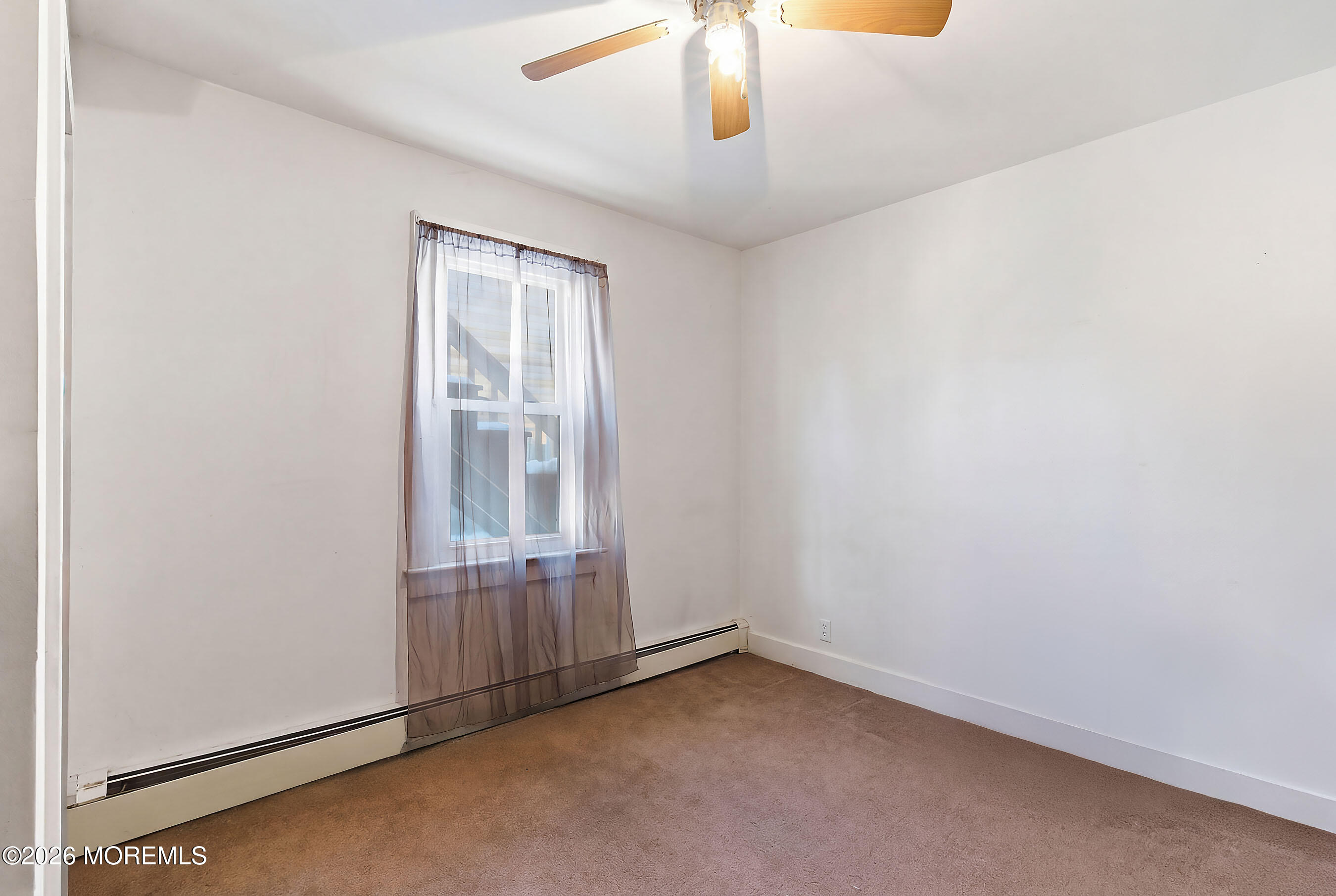 523 Martin Road Toms River, NJ 08753 - Photo 14 of 21 an empty room with a window