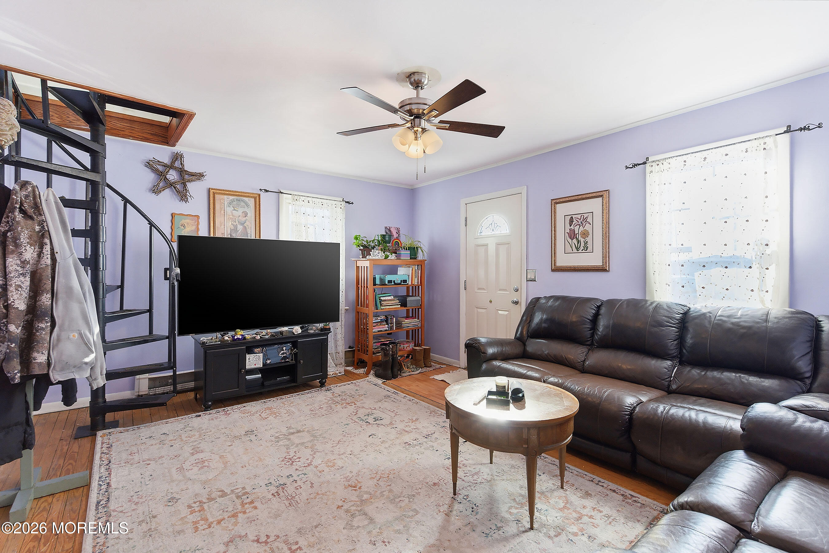 523 Martin Road Toms River, NJ 08753 - Photo 3 of 21 a living room with furniture and a flat screen tv