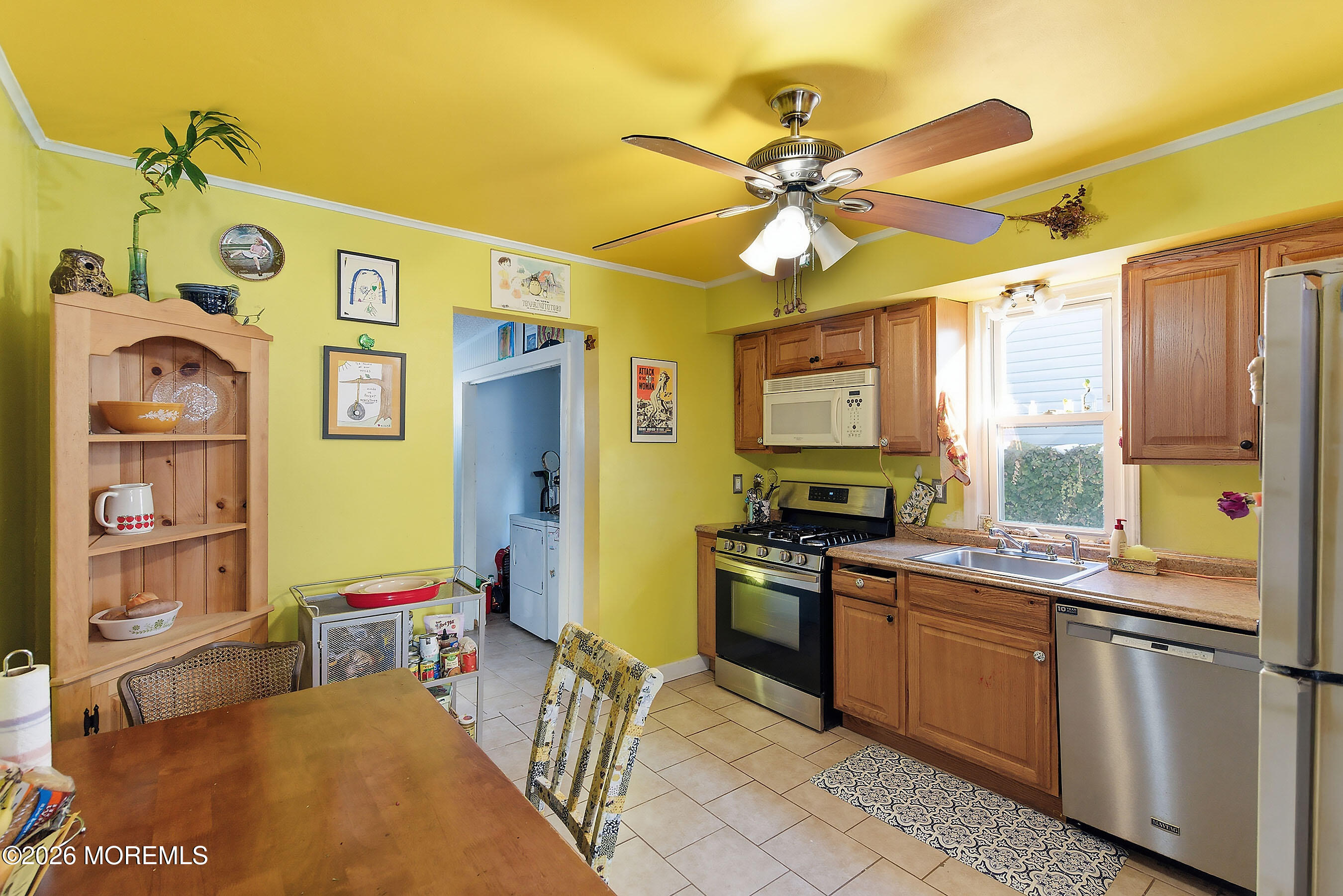 523 Martin Road Toms River, NJ 08753 - Photo 5 of 21 a kitchen that has a lot of cabinets in it and stainless steel appliances