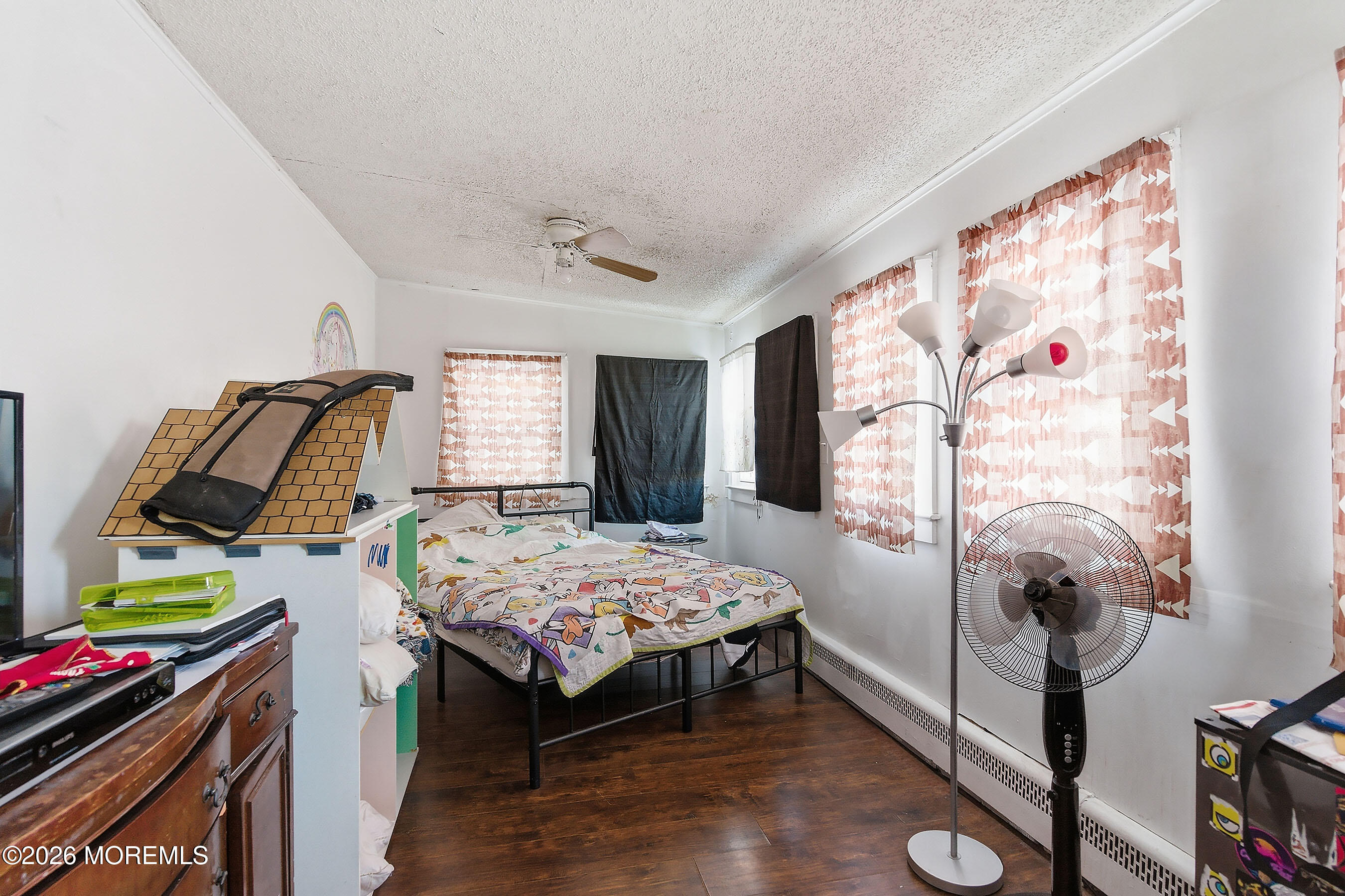 523 Martin Road Toms River, NJ 08753 - Photo 8 of 21 a bedroom with a bed and a window