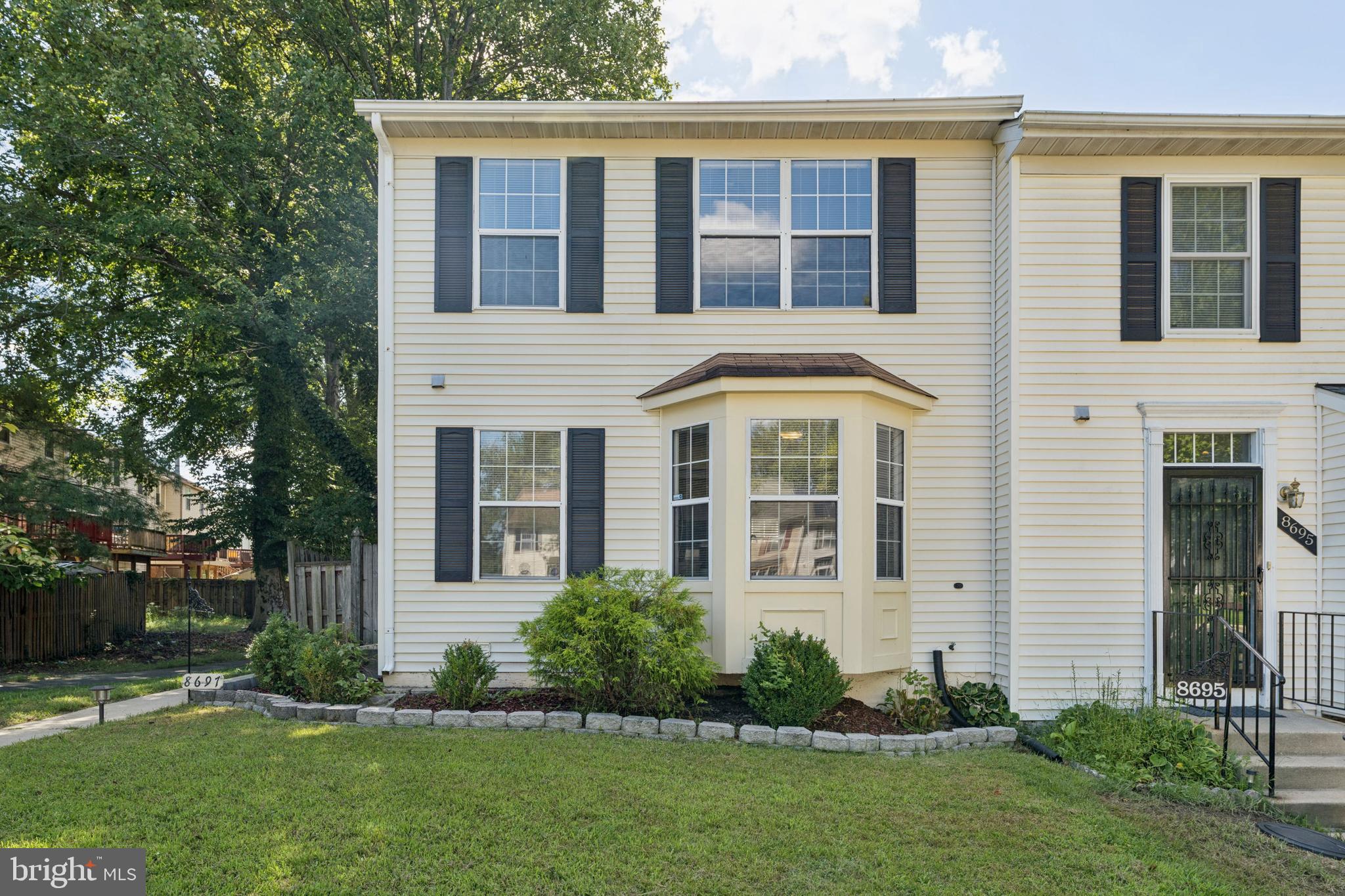 8697 Ritchboro Road District Heights, MD 20747 - Photo 1 of 25 front view of house with a yard