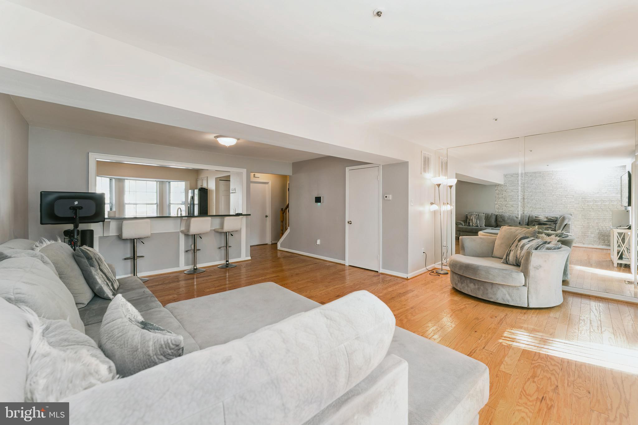 8697 Ritchboro Road District Heights, MD 20747 - Photo 5 of 25 a living room with furniture and view of kitchen