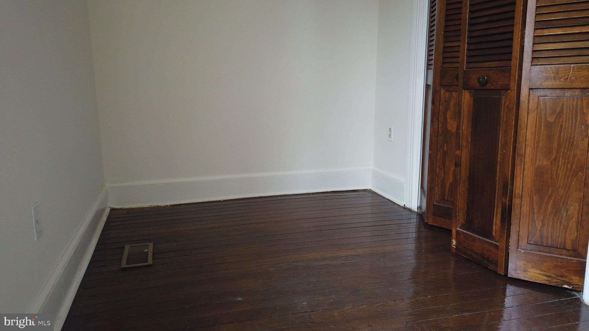604 9th Street Northeast Washington, DC 20002 - Photo 16 of 28 Spacious room with rich wooden floors.