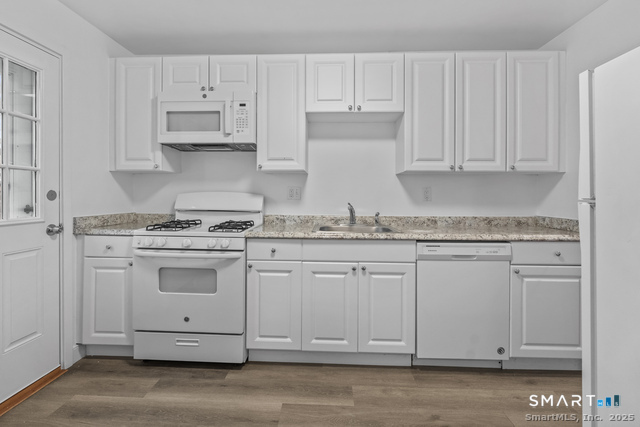 Photos are of another unit, same layout. Finishes may vary.