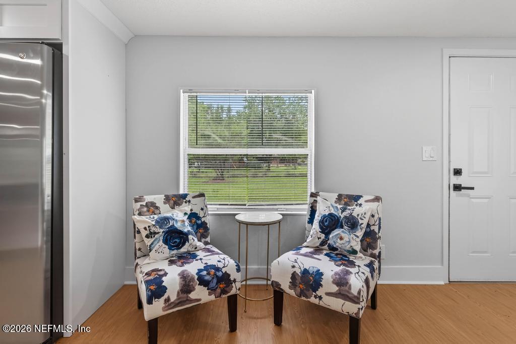 43739 Ratliff Road Callahan, FL 32011 - Photo 32 of 55 a room with furniture and a window