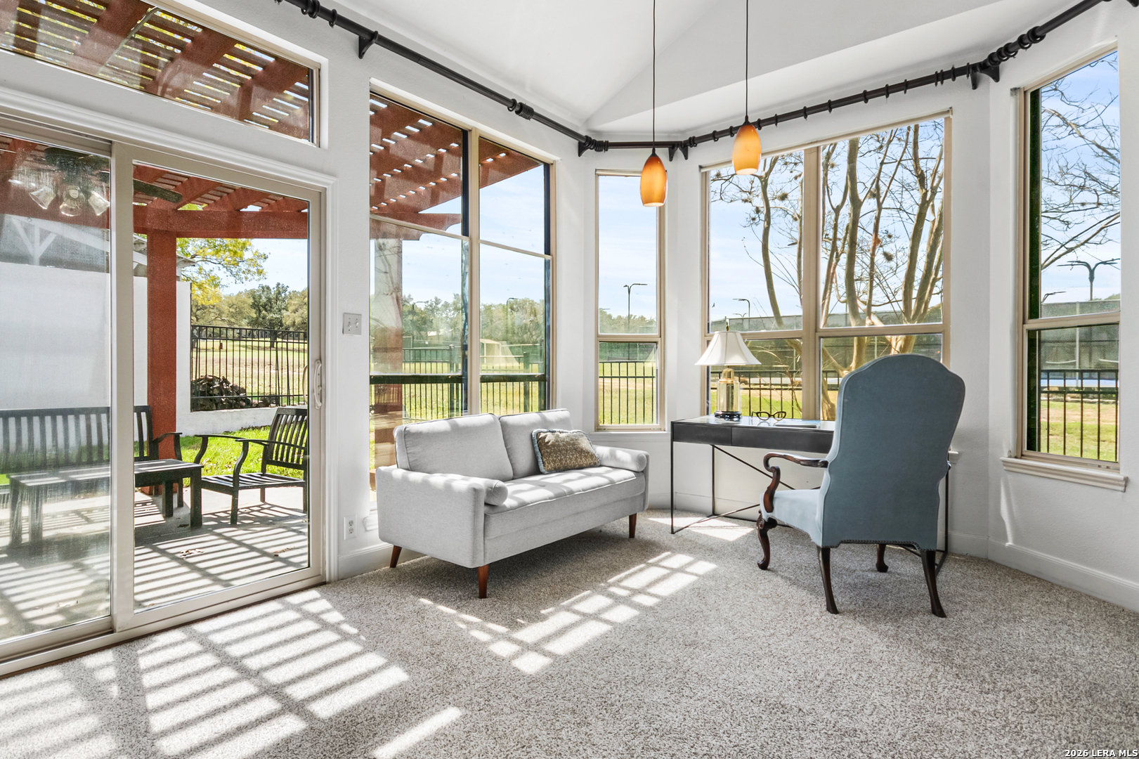 29439 Summit Ridge Drive Fair Oaks Ranch, TX 78015 - Photo 15 of 34 a living room with furniture and a floor to ceiling window