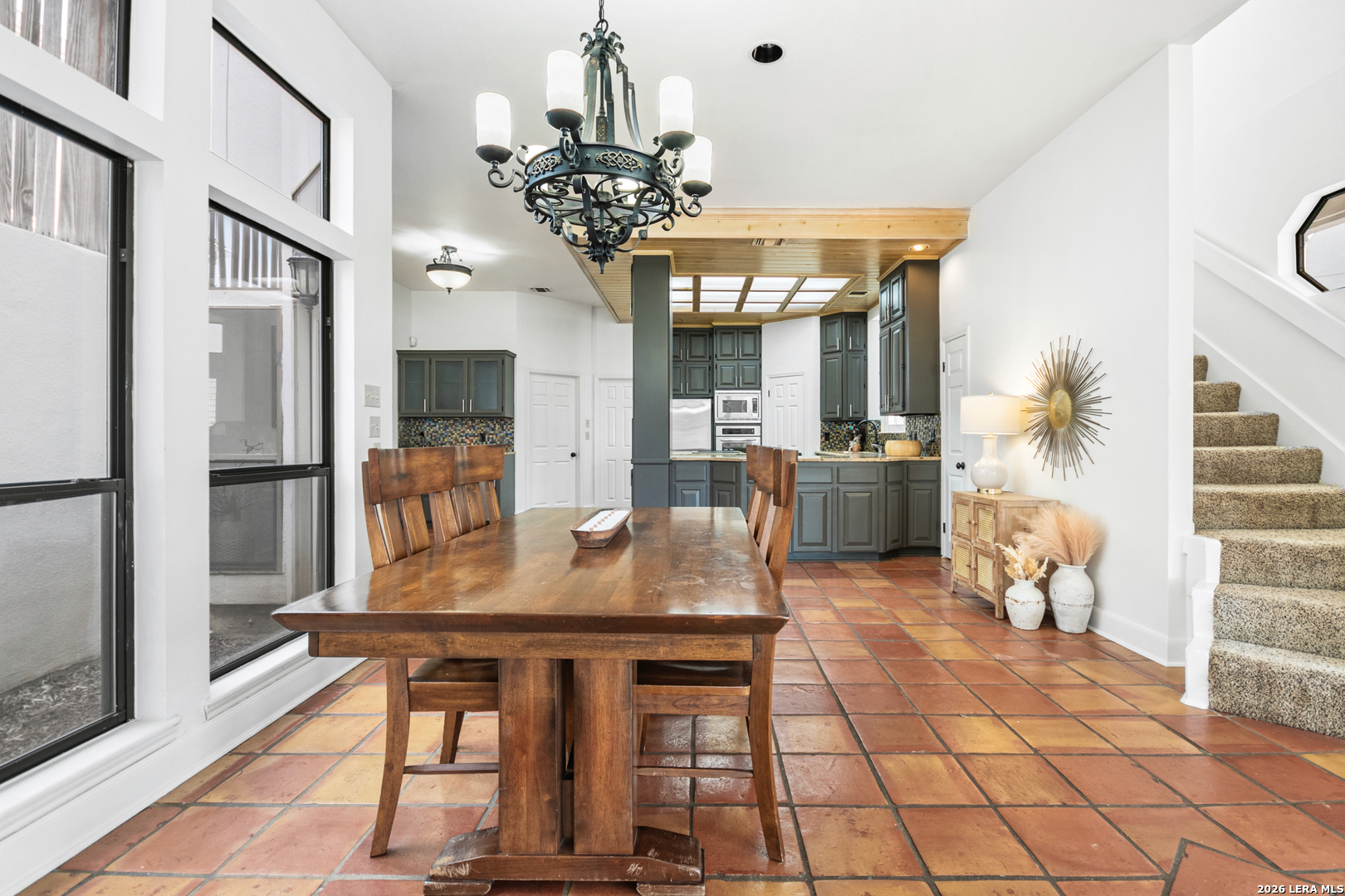29439 Summit Ridge Drive Fair Oaks Ranch, TX 78015 - Photo 19 of 34 a dining room with furniture and chandelier