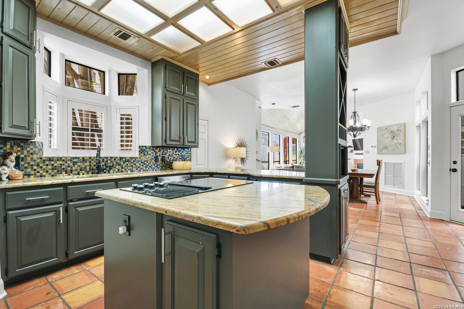 29439 Summit Ridge Drive Fair Oaks Ranch, TX 78015 - Photo 25 of 34 a kitchen with a sink a counter top space and cabinets