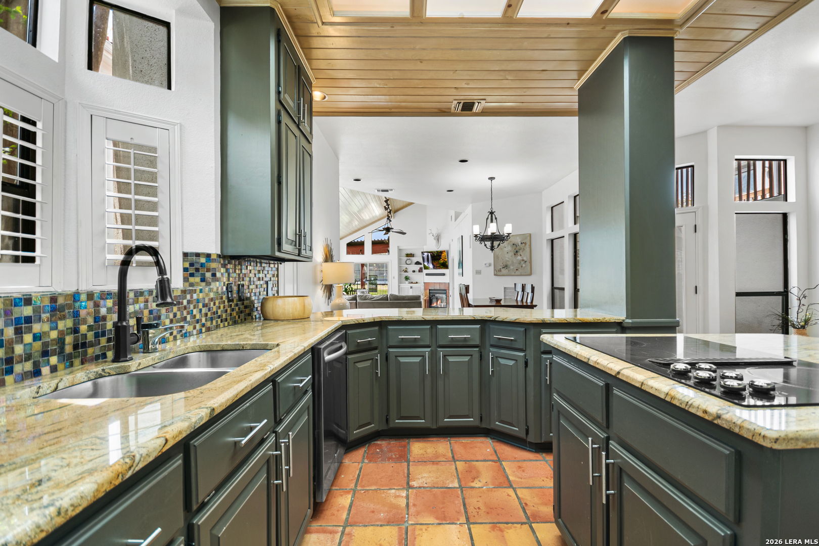29439 Summit Ridge Drive Fair Oaks Ranch, TX 78015 - Photo 27 of 34 a kitchen with a sink and cabinets
