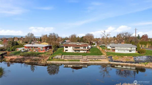 a view of a lake with a city