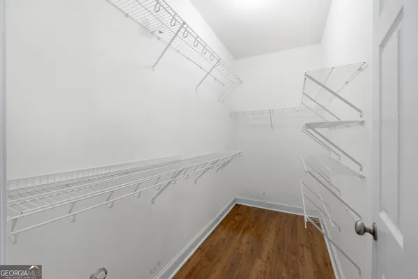 a view of a room with racks on the wall